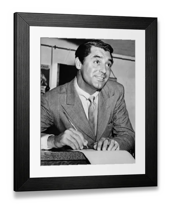 Framed Print : Cary Grant with His US Citizenship Papers Framed Print : Cary Grant with His US Citizenship Papers