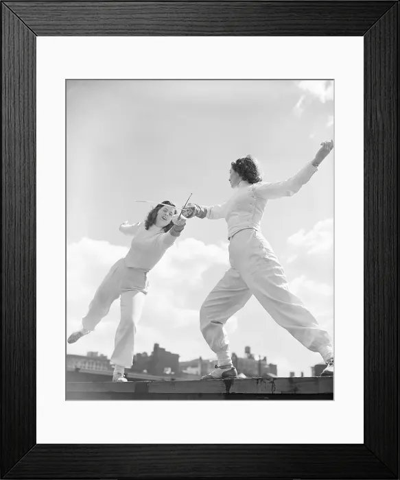 Framed Print : Two Women Fencing on Rooftop Framed Print : Two Women Fencing on Rooftop