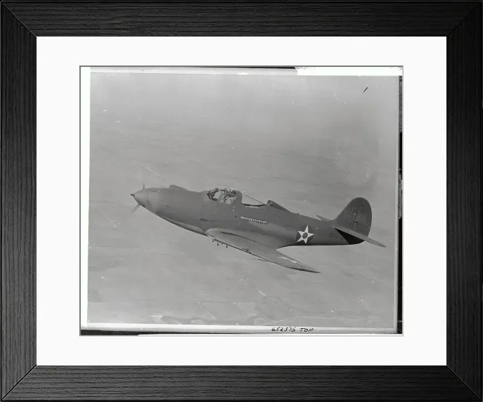Framed Print : Us Air Force Plane P-39 Flying Over Land Framed Print : Us Air Force Plane P-39 Flying Over Land
