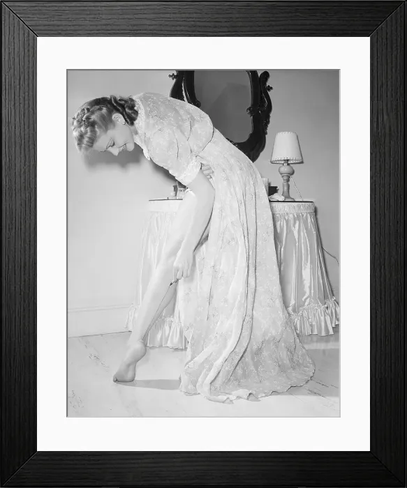 Framed Print : Woman Drawing Stocking Seam with Pen Framed Print : Woman Drawing Stocking Seam with Pen