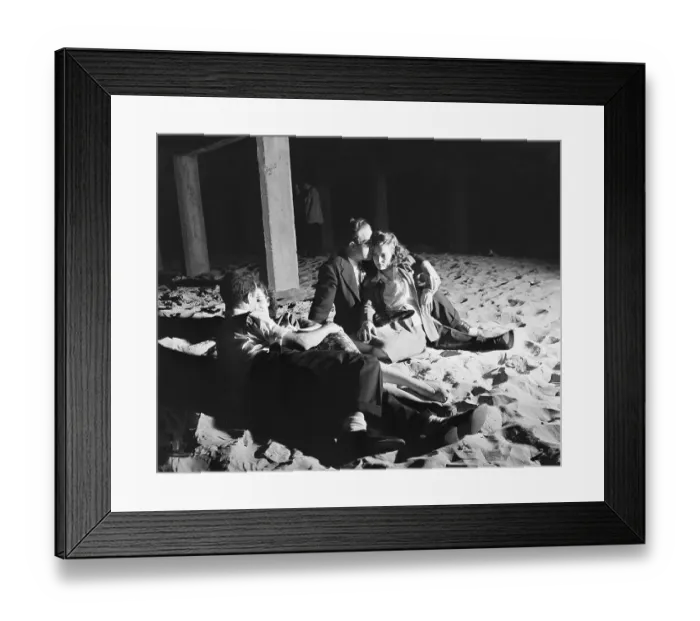 Framed Print : Young Couples Snuggle on Beach Framed Print : Young Couples Snuggle on Beach