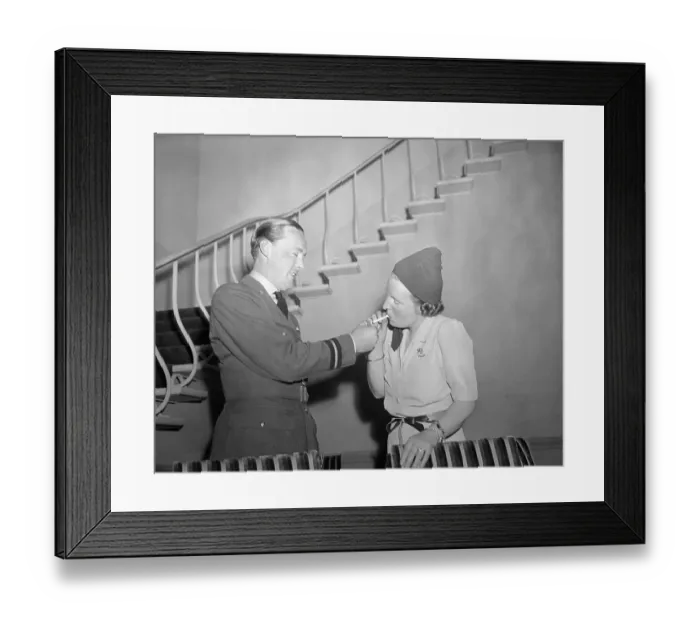 Framed Print : Prince Bernhard Lighting Cigarette for Princess Juliana Framed Print : Prince Bernhard Lighting Cigarette for Princess Juliana