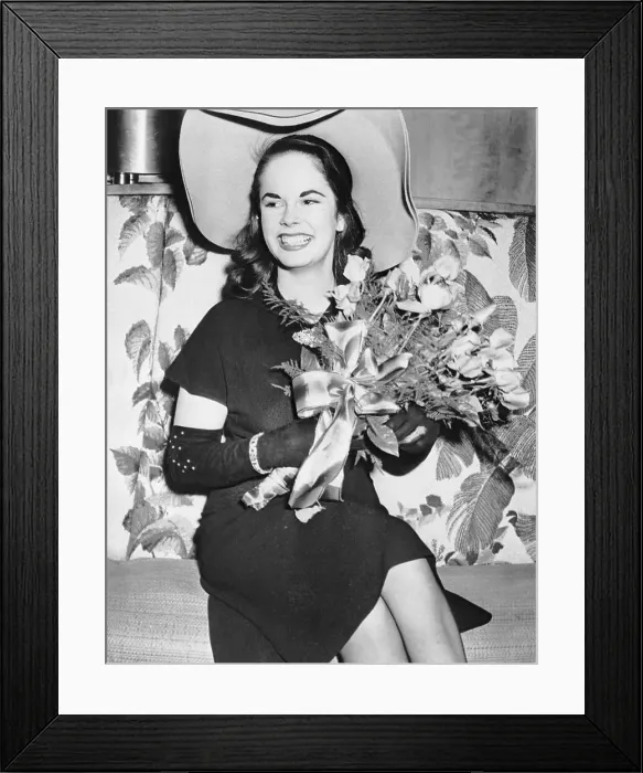 Framed Print : Oona O'Neill Seated With Flowers Framed Print : Oona O'Neill Seated With Flowers