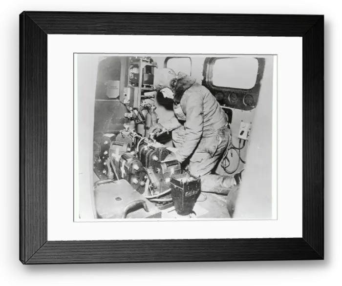 Framed Print : War Photographer in Plane with Equipment