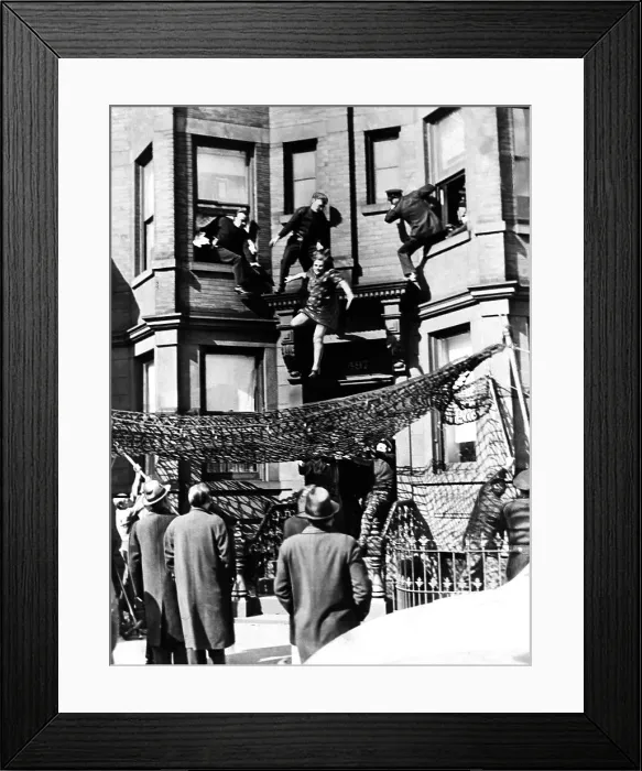 Framed Print : Woman Pushed Off Ledge Onto Police Net Framed Print : Woman Pushed Off Ledge Onto Police Net
