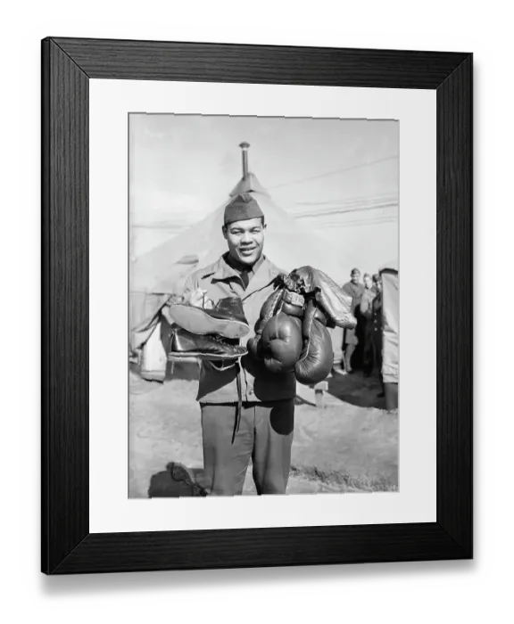 Framed Print : Joe Louis Holding Boxing Gloves and Shoes Framed Print : Joe Louis Holding Boxing Gloves and Shoes