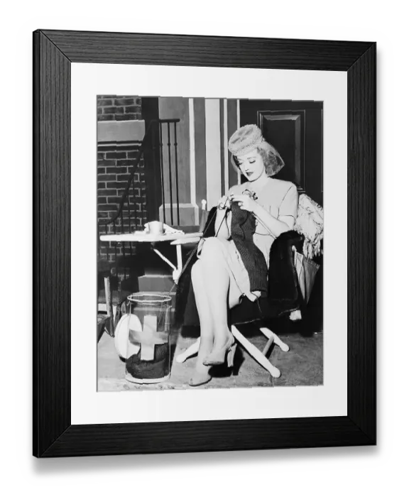 Framed Print : Portrait of Bette Davis Knitting Sweaters