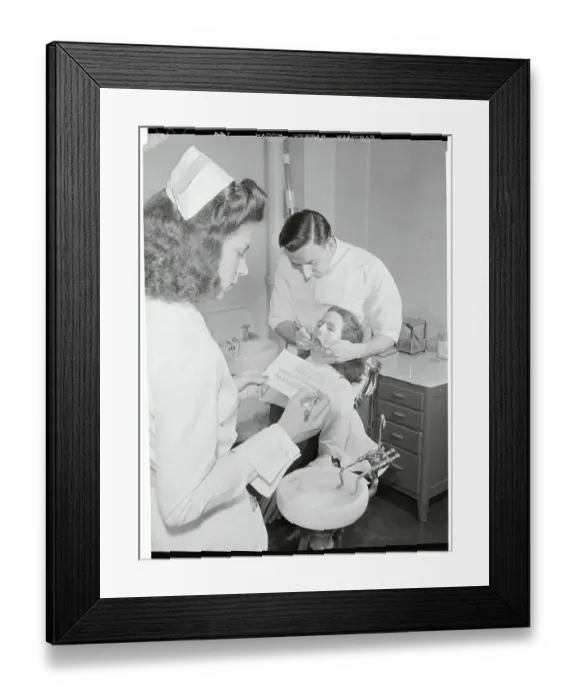 Framed Print : Dentists Performing a Dental Examination Framed Print : Dentists Performing a Dental Examination