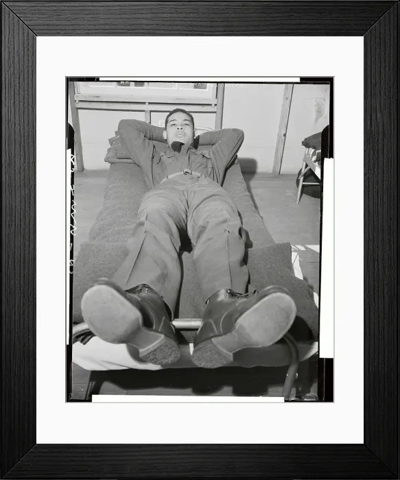 Framed Print : Joe Louis Resting on His Army Cot Framed Print : Joe Louis Resting on His Army Cot