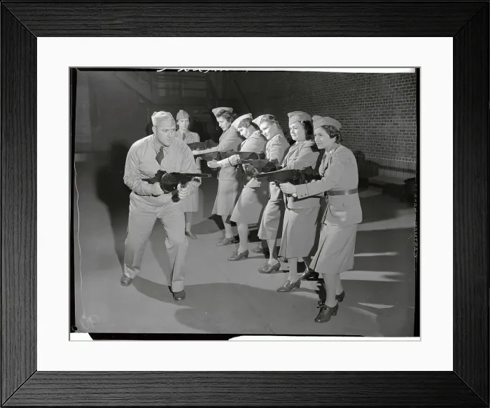 Framed Print : Women in Military Training with Weapons