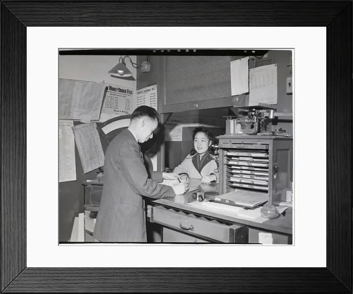 Framed Print : Ju Kim Sells Stamps To Emma Lum Framed Print : Ju Kim Sells Stamps To Emma Lum