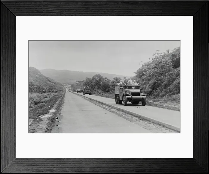 Framed Print : Military Tanks Traveling on New Highway Framed Print : Military Tanks Traveling on New Highway