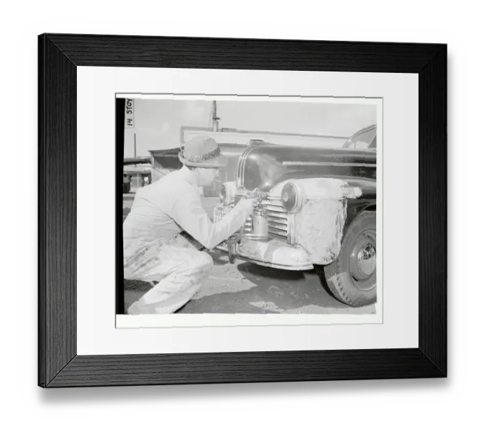 Framed Print : Workman Spraying Auto with Black Paint Framed Print : Workman Spraying Auto with Black Paint