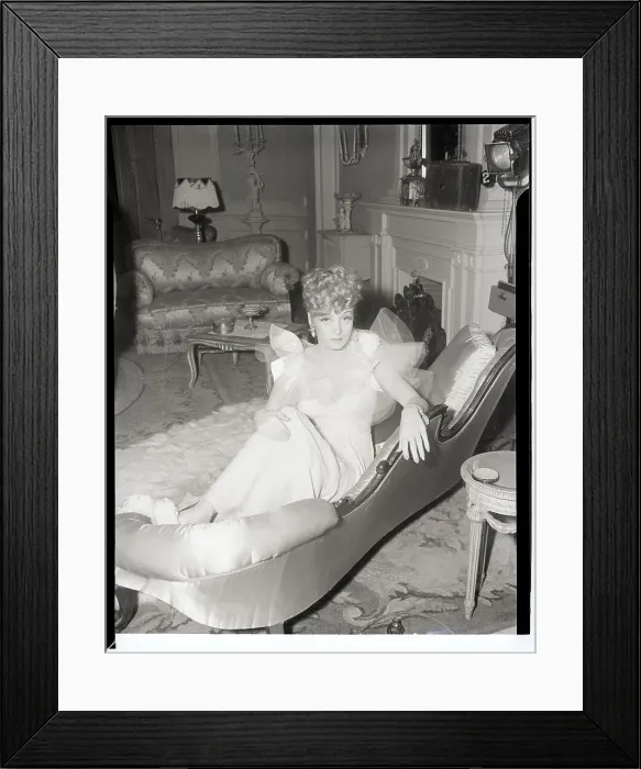 Framed Print : Marlene Dietrich Seated On Couch Framed Print : Marlene Dietrich Seated On Couch