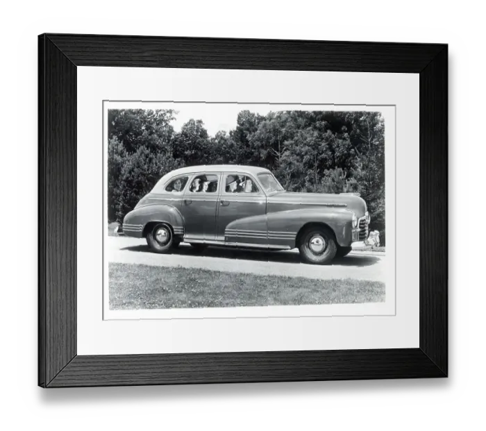 Framed Print : Side View of Pontiac Four-Door on Road Framed Print : Side View of Pontiac Four-Door on Road