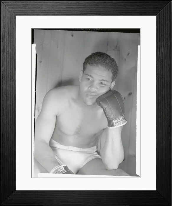 Framed Print : Joe Louis Sitting with Gloved Hand on Cheek Framed Print : Joe Louis Sitting with Gloved Hand on Cheek