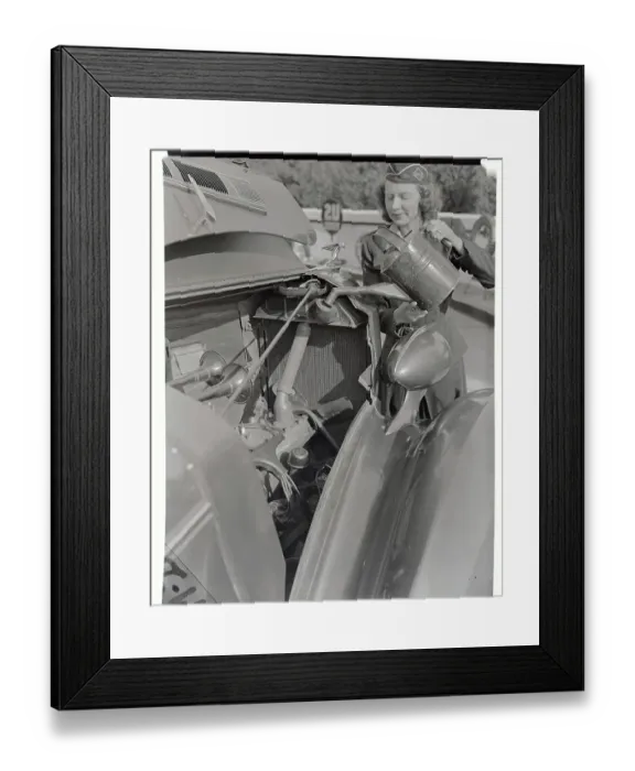 Framed Print : Girl Pouring Water into Car Radiator Framed Print : Girl Pouring Water into Car Radiator