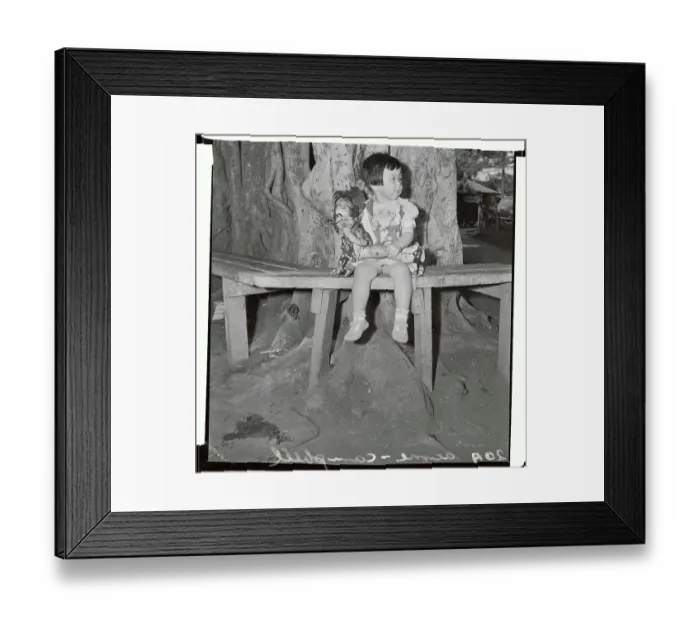 Framed Print : Small Girl Sitting on Bench with Doll Framed Print : Small Girl Sitting on Bench with Doll