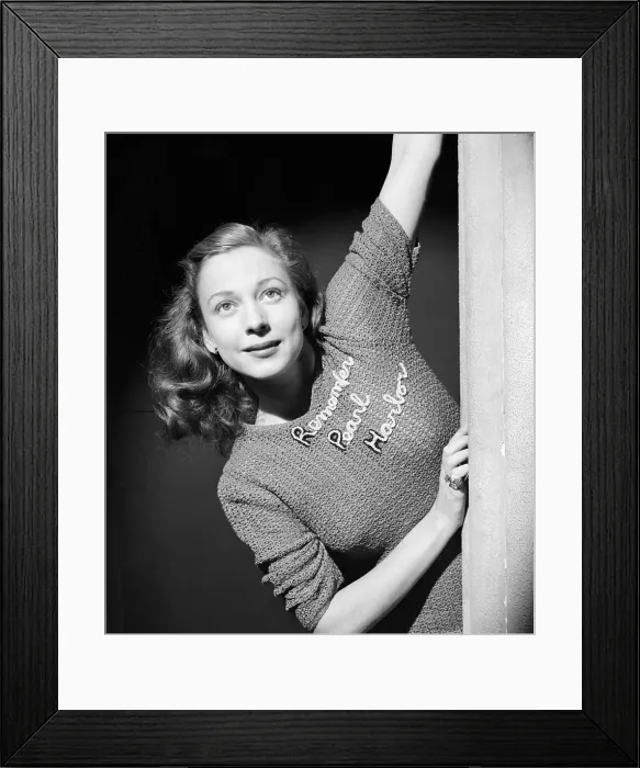 Framed Print : Young Woman Modeling National Slogan on Her Sweater Framed Print : Young Woman Modeling National Slogan on Her Sweater