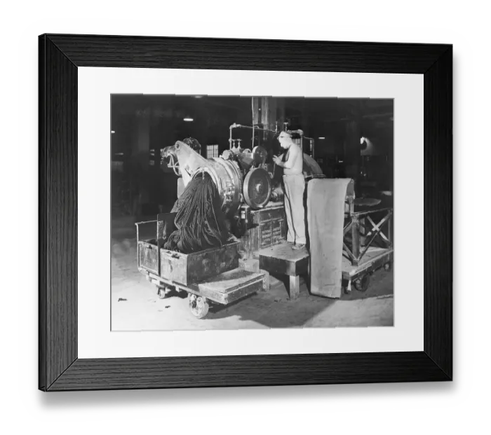Framed Print : Men Working with Rubber Tires for Reusing Process Framed Print : Men Working with Rubber Tires for Reusing Process