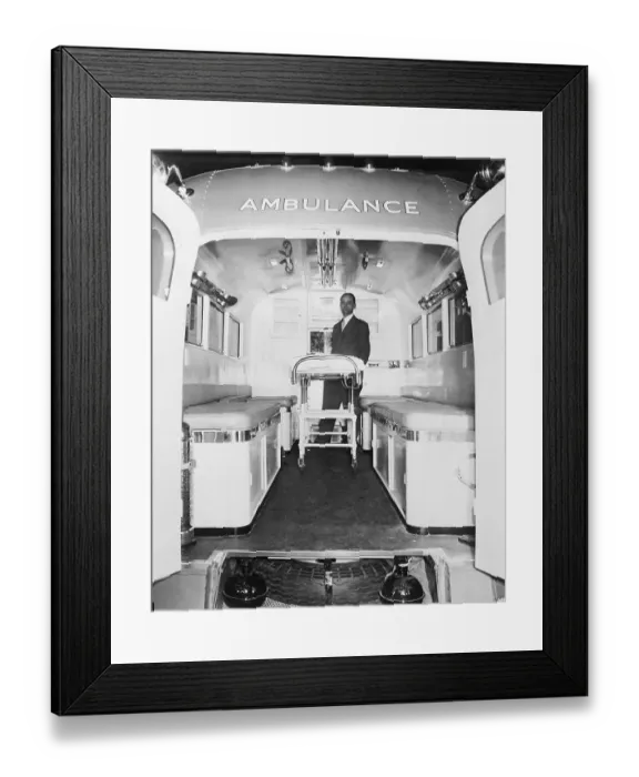 Framed Print : Man Standing Inside Large Ambulance Vehicle Framed Print : Man Standing Inside Large Ambulance Vehicle