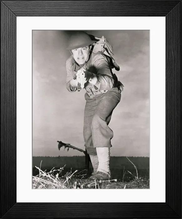 Framed Print : Soldier with Weapon in Attack Stance Framed Print : Soldier with Weapon in Attack Stance