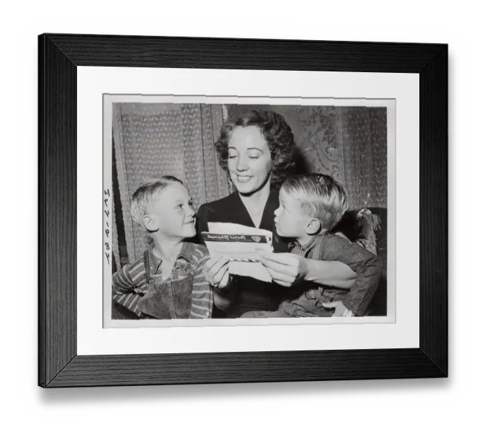 Framed Print : Wife of War Hero Reading to Her Children Framed Print : Wife of War Hero Reading to Her Children