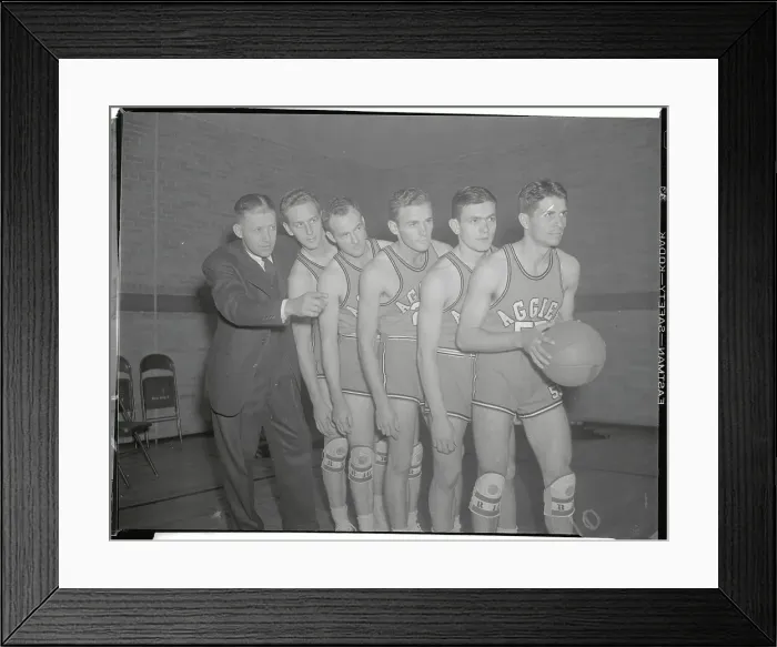Framed Print : Basketball Teammates and Coach Posing with Ball Framed Print : Basketball Teammates and Coach Posing with Ball