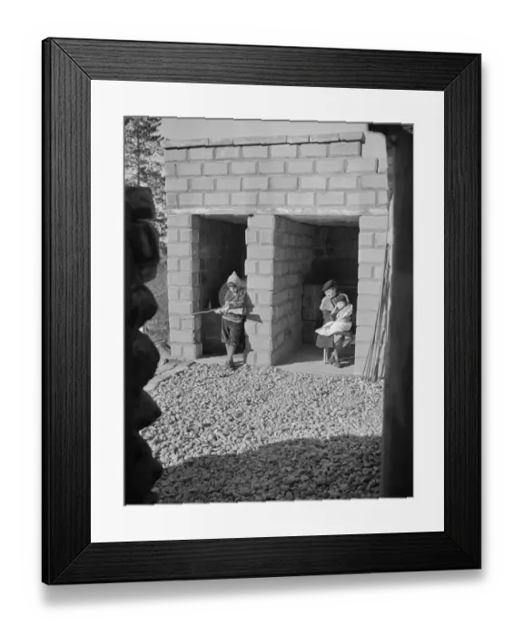 Framed Print : Mr. and Mrs. McKinney in Air Raid Shelter with Son Framed Print : Mr. and Mrs. McKinney in Air Raid Shelter with Son