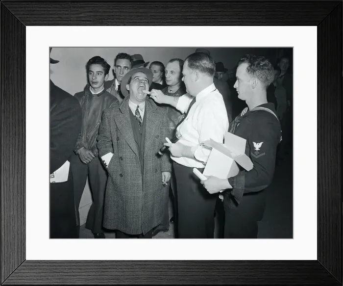 Framed Print : Doctor Checking The Mouth of a New Prospective Recruit Framed Print : Doctor Checking The Mouth of a New Prospective Recruit