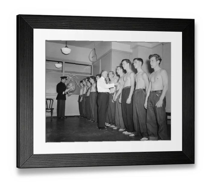 Framed Print : Military Recruits Being Examined While Standing in a Line