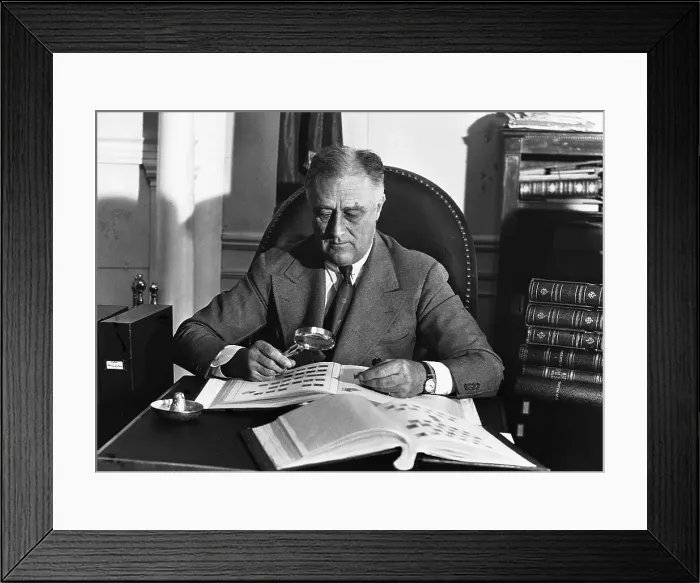 Framed Print : Franklin Delano Roosevelt Looking at His Stamp Collection Framed Print : Franklin Delano Roosevelt Looking at His Stamp Collection