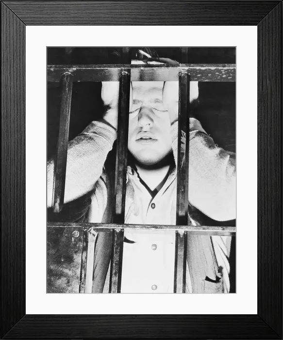 Framed Print : Young Eugene Ratajczak Standing Behind Jail Cell Bars Framed Print : Young Eugene Ratajczak Standing Behind Jail Cell Bars