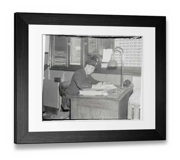 Framed Print : Man Working in Department Answering Raid Alarm Office Framed Print : Man Working in Department Answering Raid Alarm Office