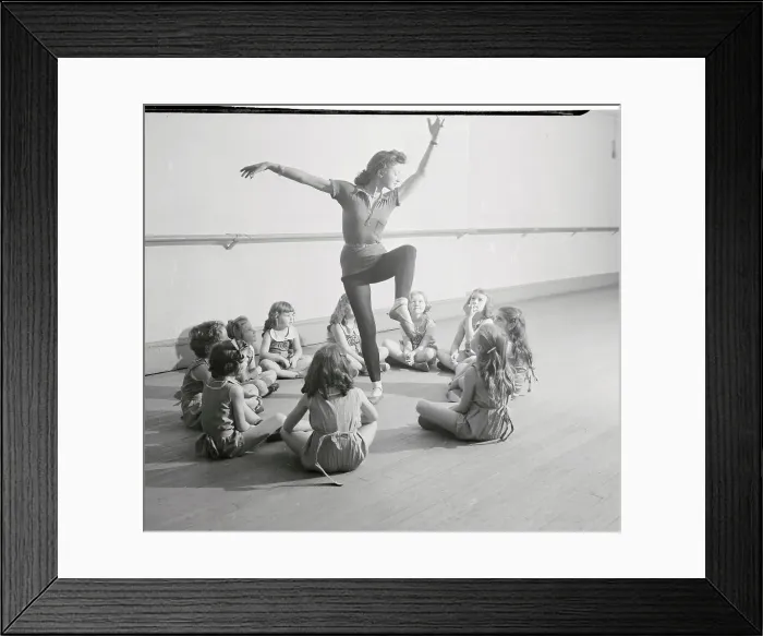 Framed Print : Young Students Observing Their Teacher Performing Ballet Moves Framed Print : Young Students Observing Their Teacher Performing Ballet Moves