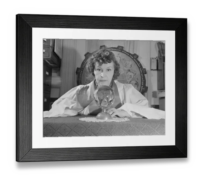 Framed Print : Fortune Teller Gazing into Ball on Table Framed Print : Fortune Teller Gazing into Ball on Table