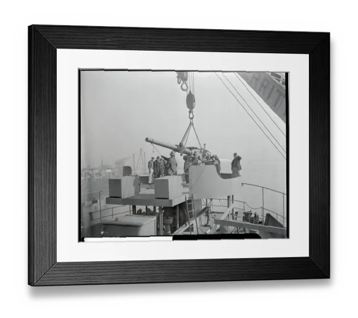 Framed Print : Deck Gun Being Placed on Ship Framed Print : Deck Gun Being Placed on Ship