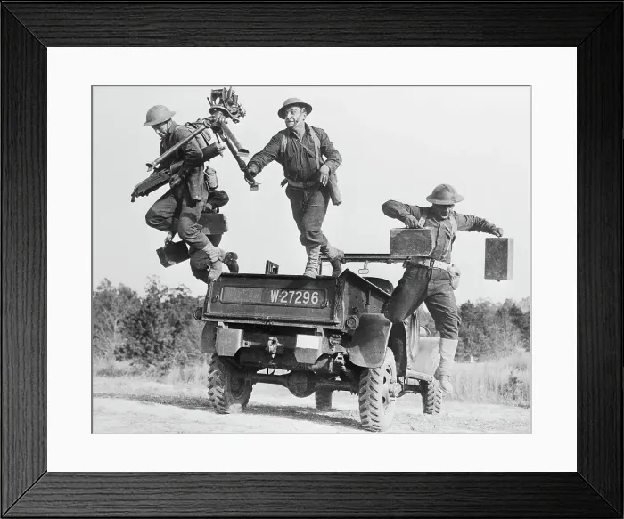 Framed Print : Soldiers Jumping off Back of Vehicle Framed Print : Soldiers Jumping off Back of Vehicle