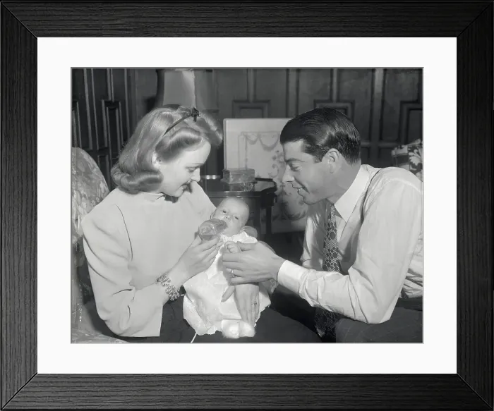 Framed Print : Mr. and Mrs. Joe DiMaggio with Their Infant Son