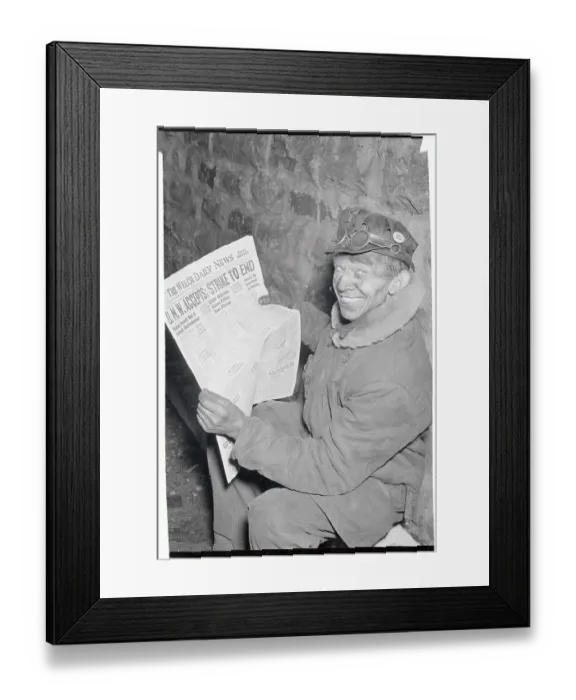 Framed Print : Veteran Mine Worker Displaying Newspaper Framed Print : Veteran Mine Worker Displaying Newspaper