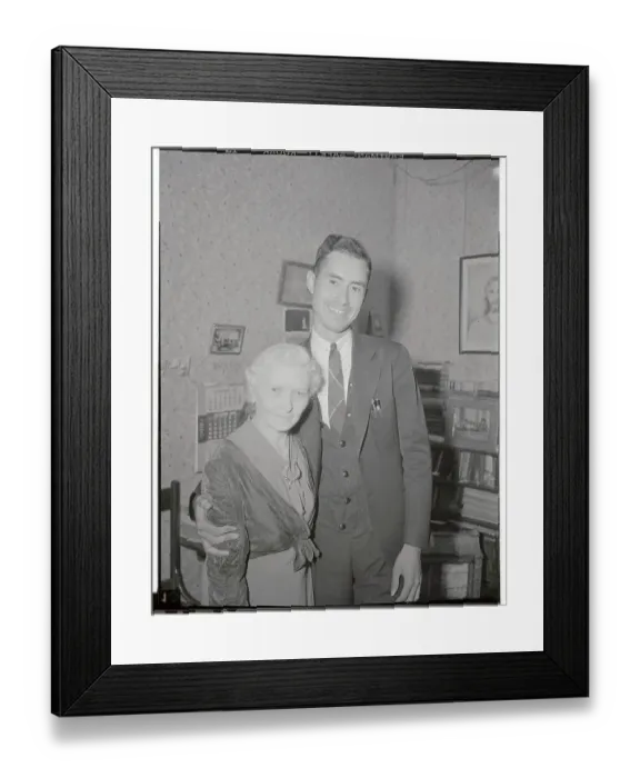 Framed Print : Young Minister Posing with His Older Wife Framed Print : Young Minister Posing with His Older Wife