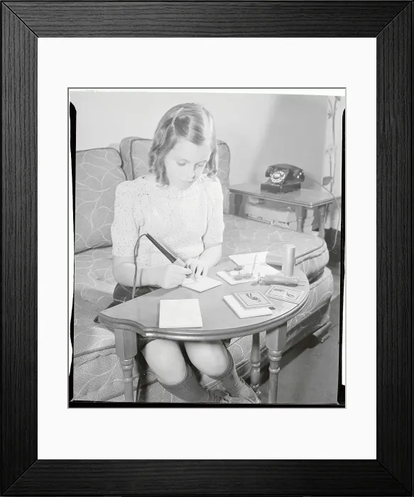 Framed Print : Girl Drawing with Electric Pen Framed Print : Girl Drawing with Electric Pen