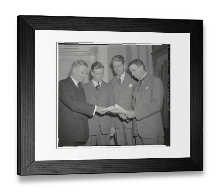 Framed Print : Representatives Looking at Magazine Framed Print : Representatives Looking at Magazine