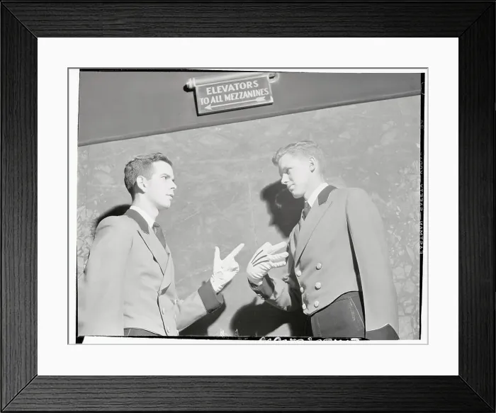 Framed Print : Two Radio City Music Hall Ushers Speaking with Signals Framed Print : Two Radio City Music Hall Ushers Speaking with Signals