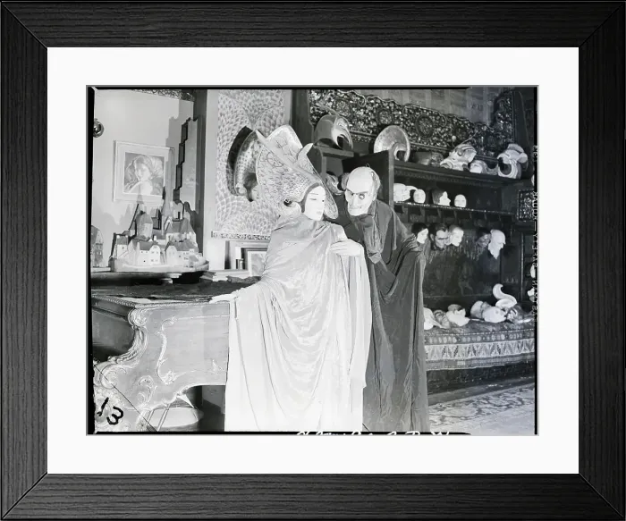 Framed Print : Man in Pestilence Mask with Woman as Goddess Framed Print : Man in Pestilence Mask with Woman as Goddess