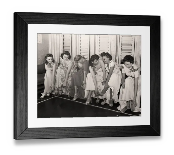 Framed Print : Women Seated Together Massaging Aches Framed Print : Women Seated Together Massaging Aches