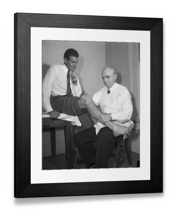Framed Print : Doctor examining leg of runner Louis Zamperini Framed Print : Doctor examining leg of runner Louis Zamperini