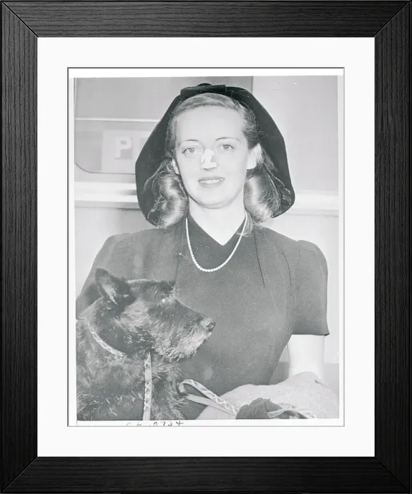 Framed Print : Bette Davis with a Dog Framed Print : Bette Davis with a Dog