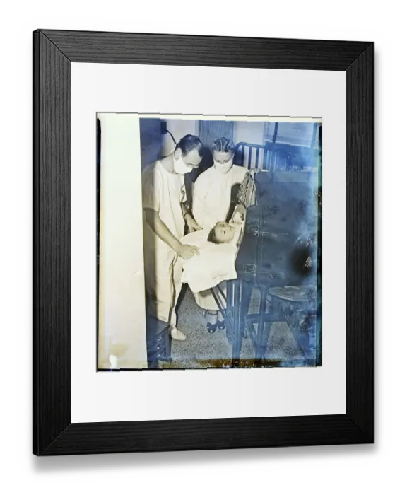 Framed Print : Parents with Child in Iron Lung Framed Print : Parents with Child in Iron Lung