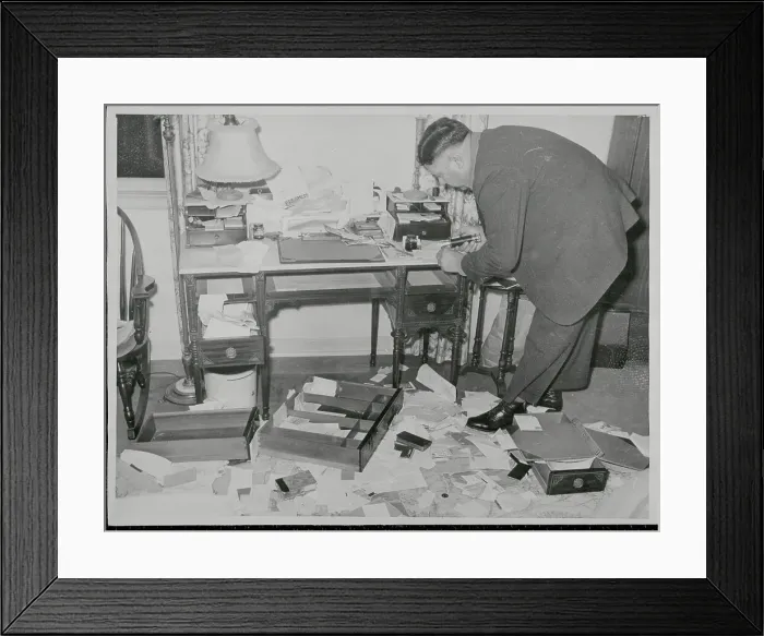Framed Print : Detective Searching Through Disarrayed Home of Victim Framed Print : Detective Searching Through Disarrayed Home of Victim
